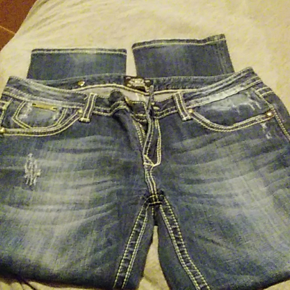 Express jeans. Some factory distressing and faded